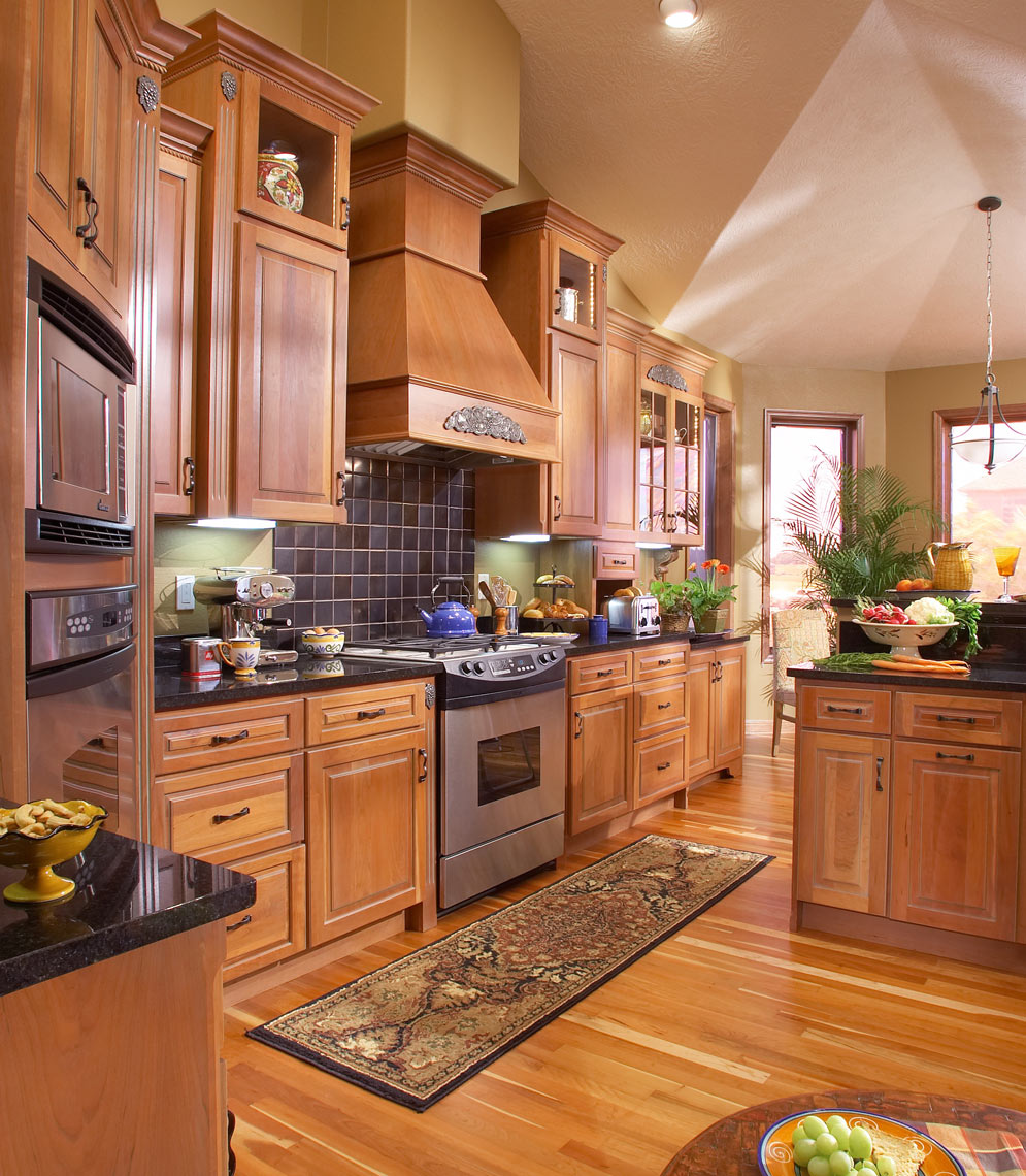 Residential kitchen/light wood floors and cabinets/architectural photo