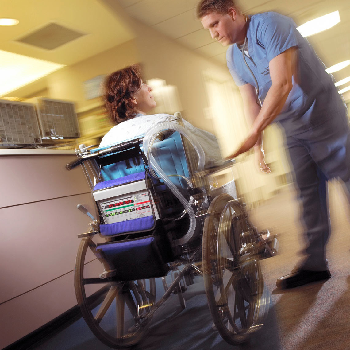 Wheelchair patient in ER/ER Docotor reasuring/Location Medical photo