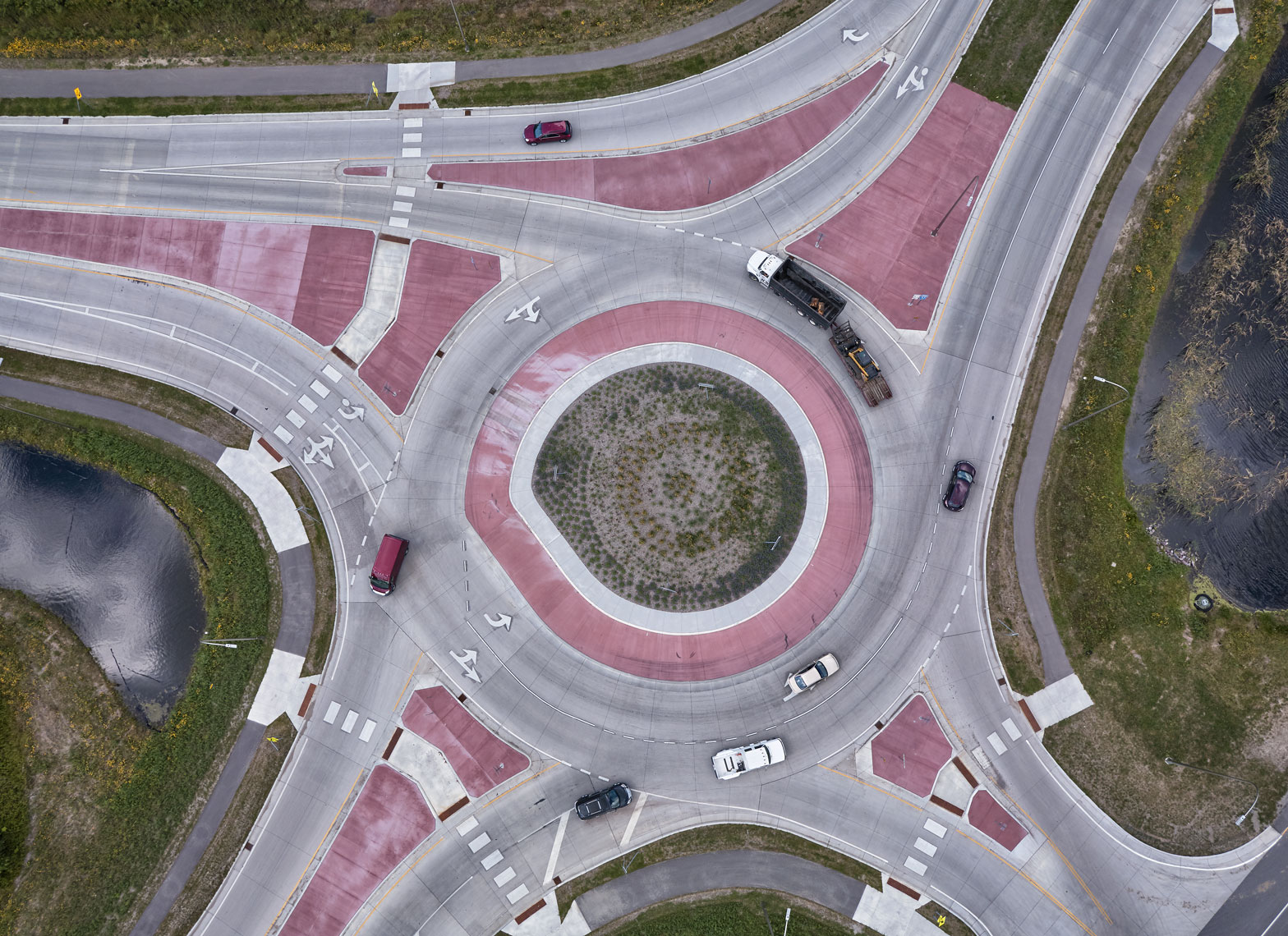 round about/cars/trucks driving/arial drone photography
