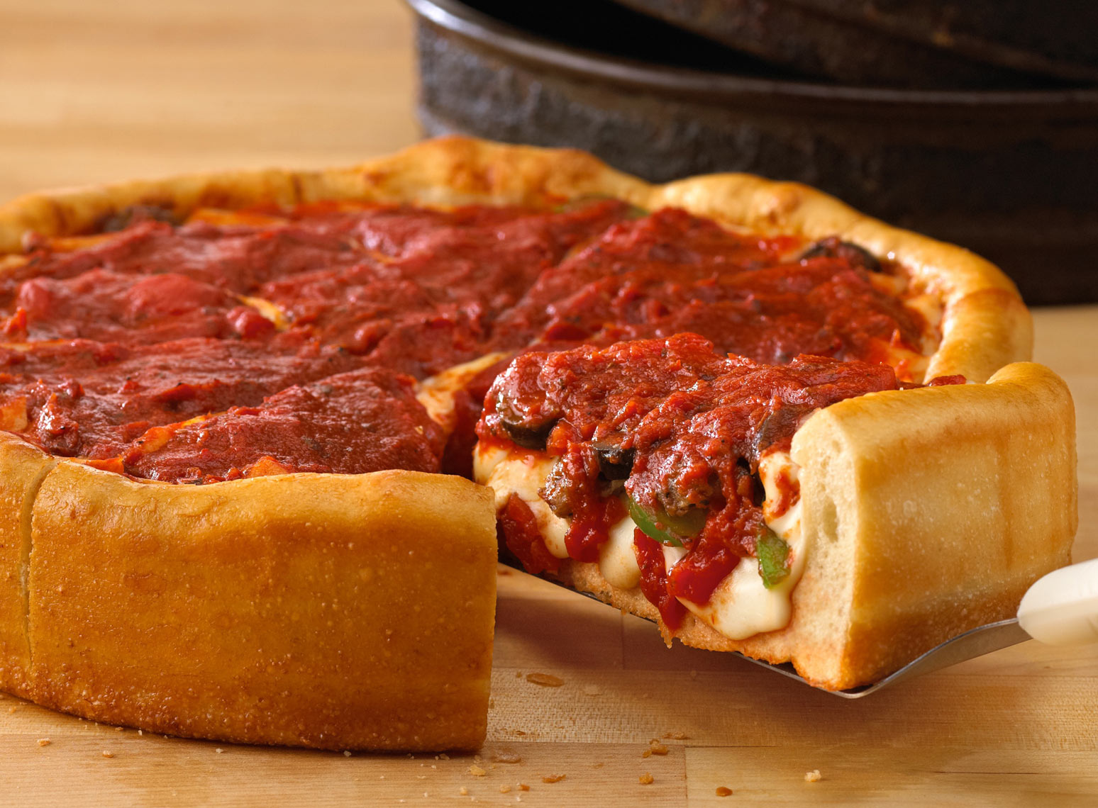 Deep Dish Pizza/cutting board/food photo/InsideOut Studios