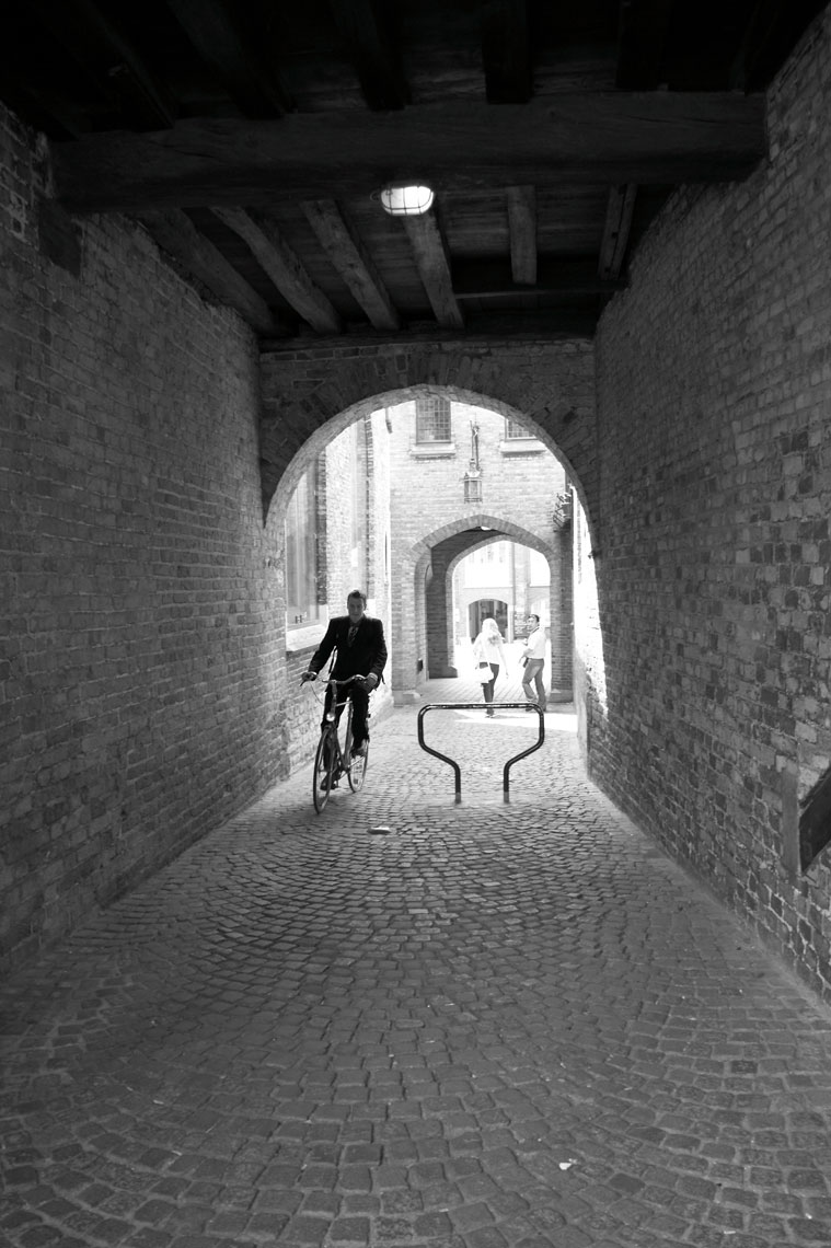 Man on bike/Brick tunnel/Black and white/Location photography