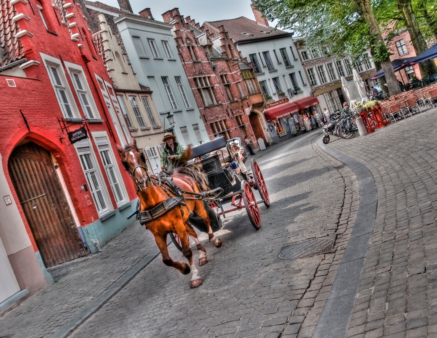 Horse and buggy/cobblestone sidewalk/old buildings/location photography