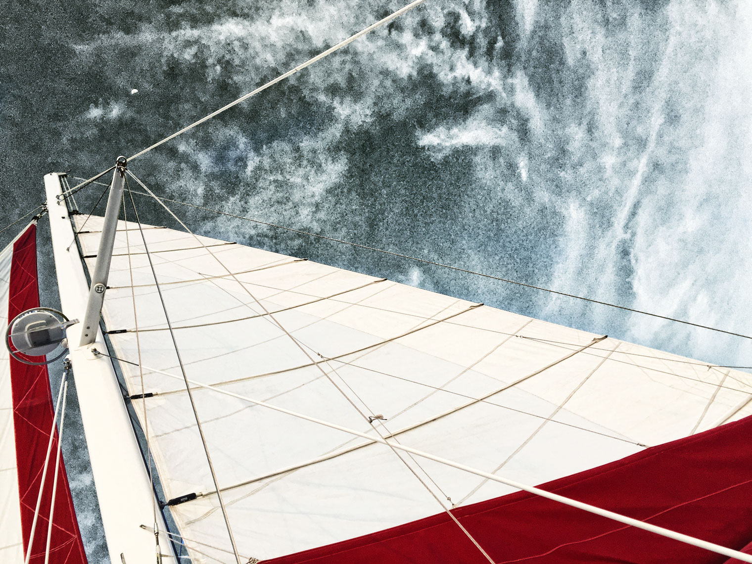 White and red sail/looking skyward/locaton photography