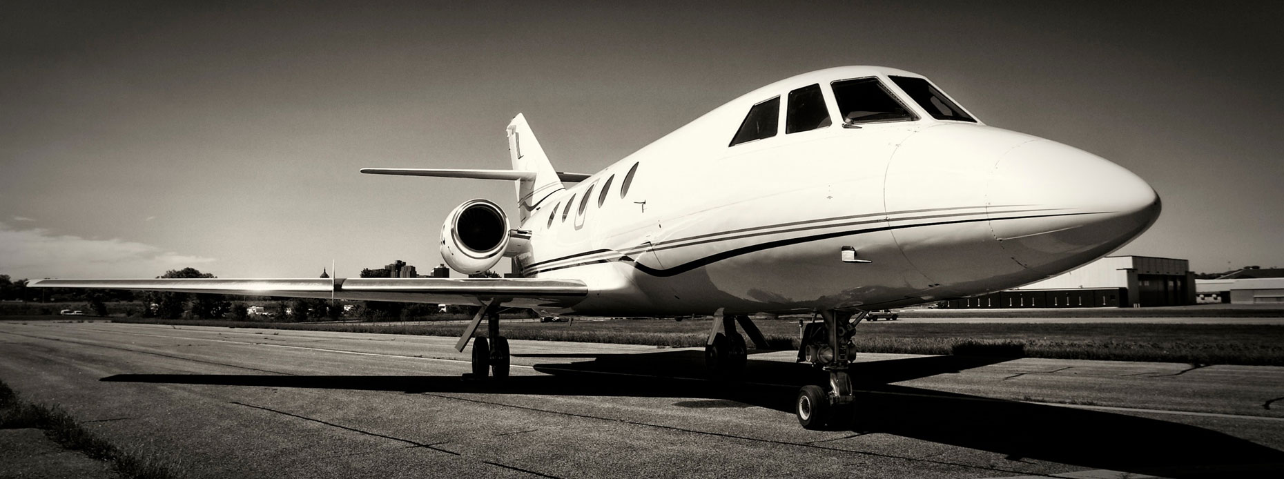 Private jet/b&w/wide angle pannoramic/runway/aviation photography