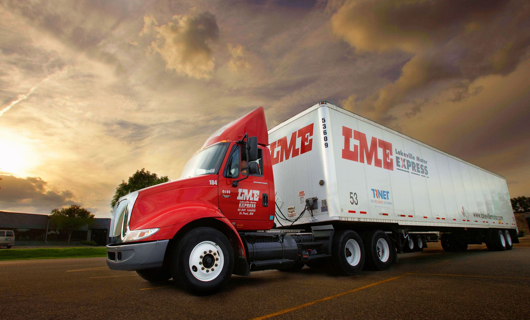 LME Semi truck/red/white trailer/sunset/location photography