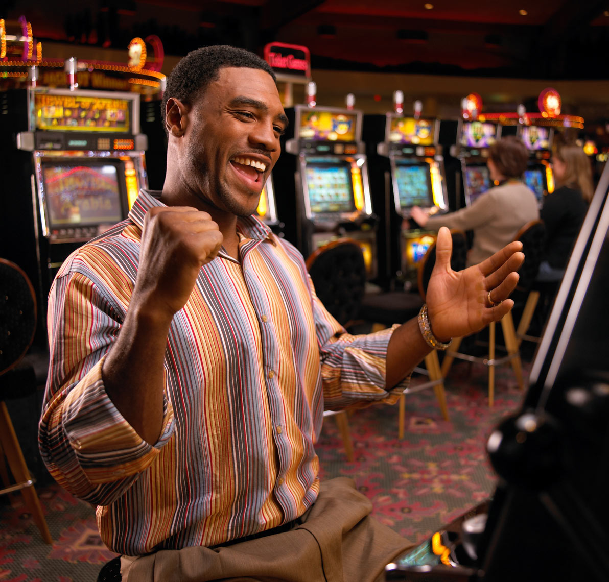 Black man/slot machine/casino/lifestyle photo