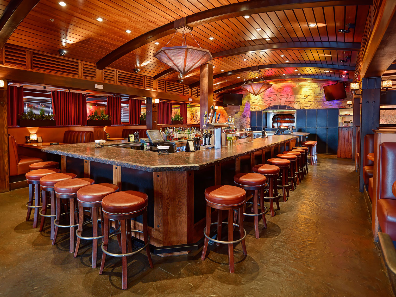 Red Stone Restaurant/central bar with stools/architectural photo