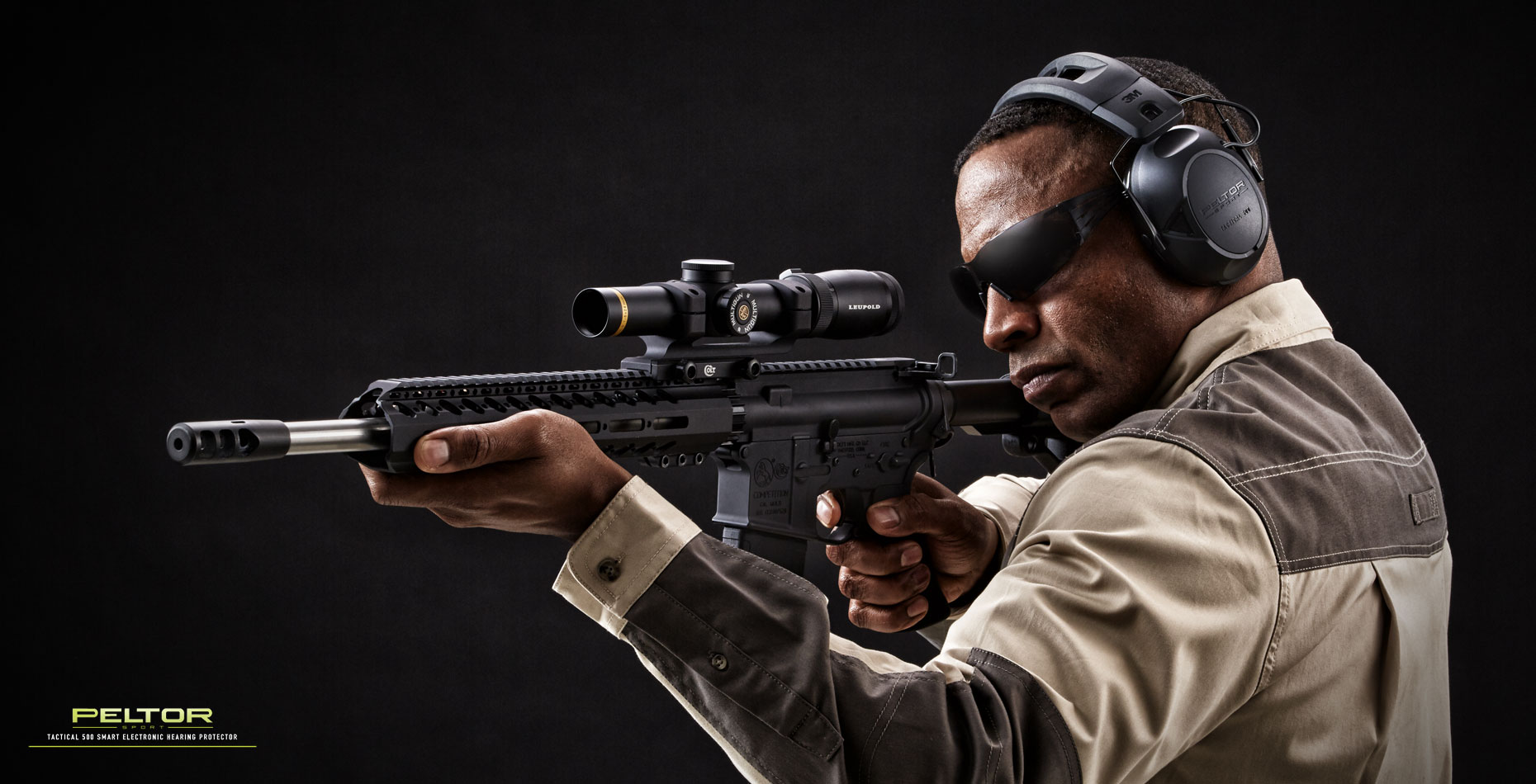 Peltor hearing protection/man/assault rifle/product photography
