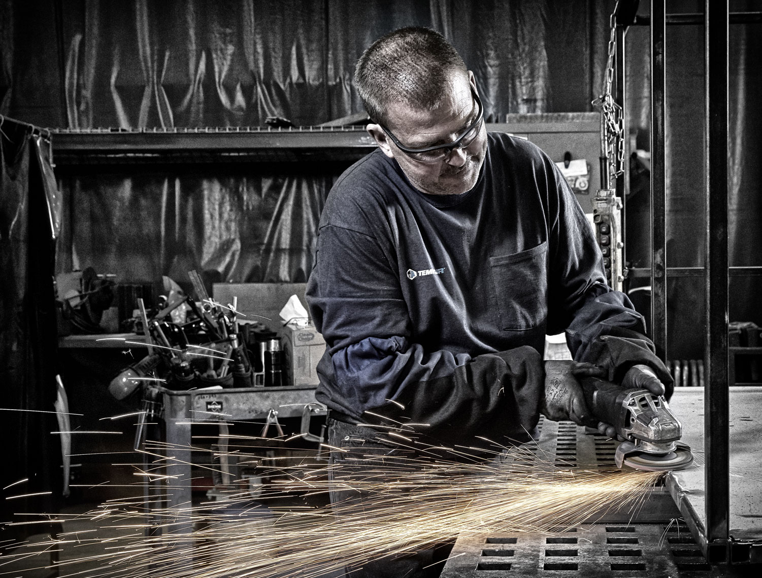 Tempair/worker grinding/sparks/b&w/lifestyle photo/InsideOut Studios