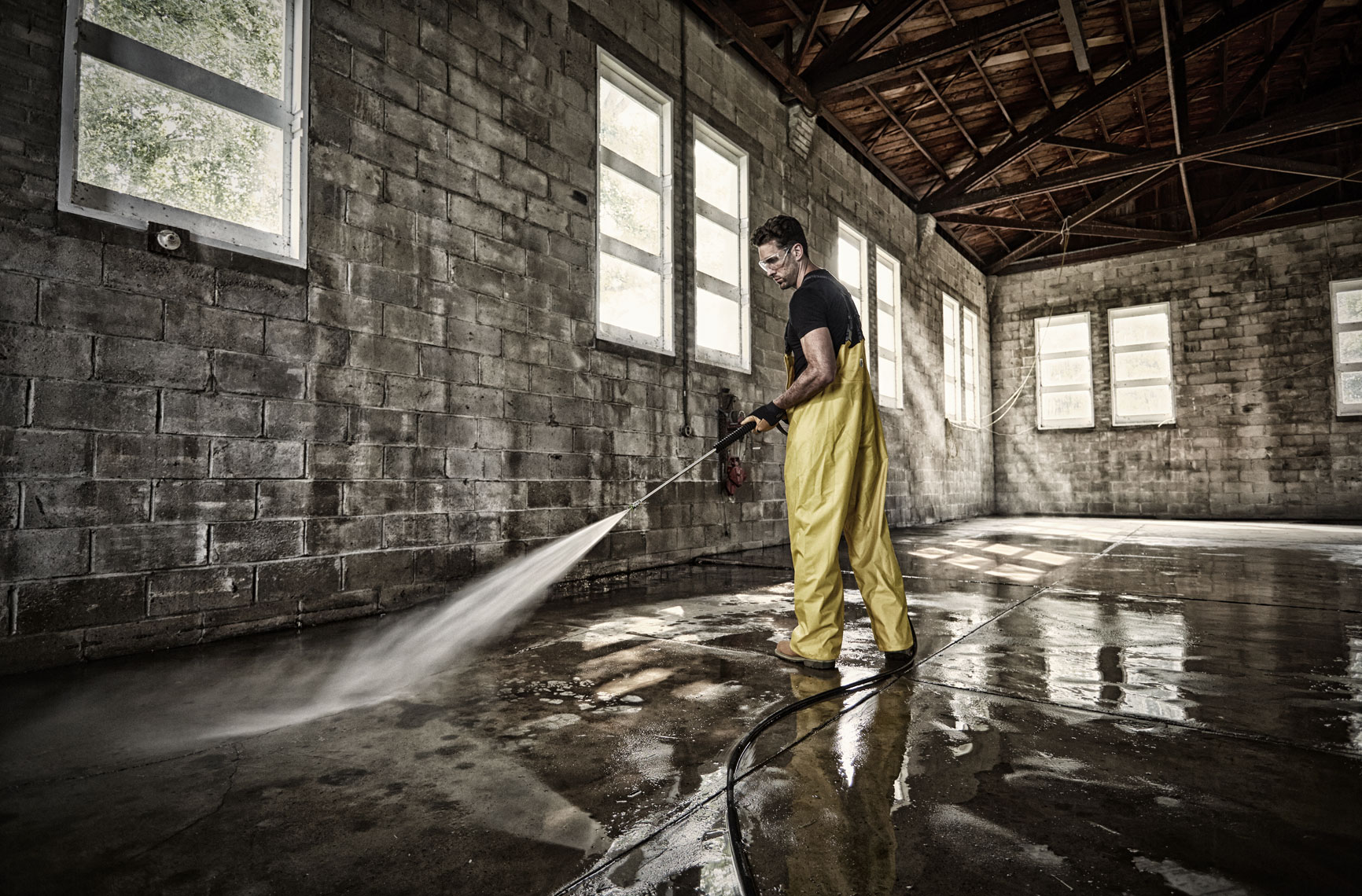 Man power washing/Veloci/brick interior/lifestyle photo