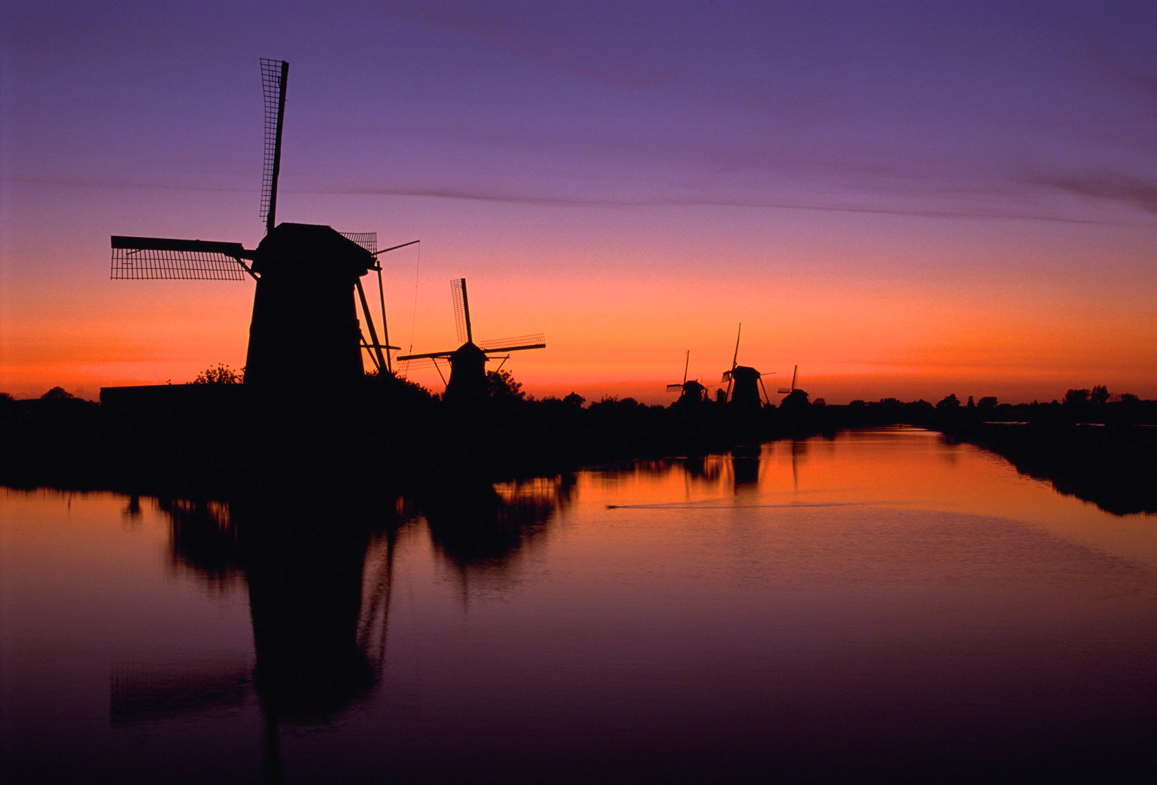 Windmills of Holland/Calm river/orange, purple sunset/locaton photography/InsideOut Studios