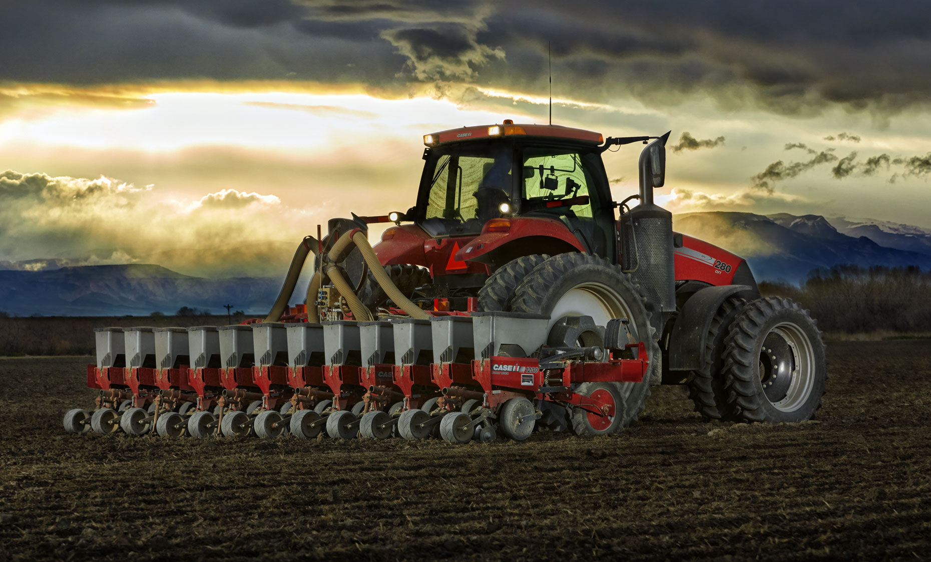 Red tracto/plowing field/sunset/agriculture photography