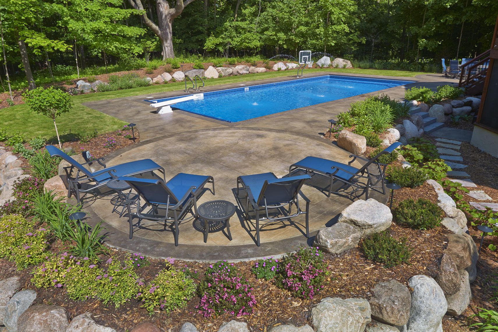 Pool in backyard/summertime/lg tile surround/location photography