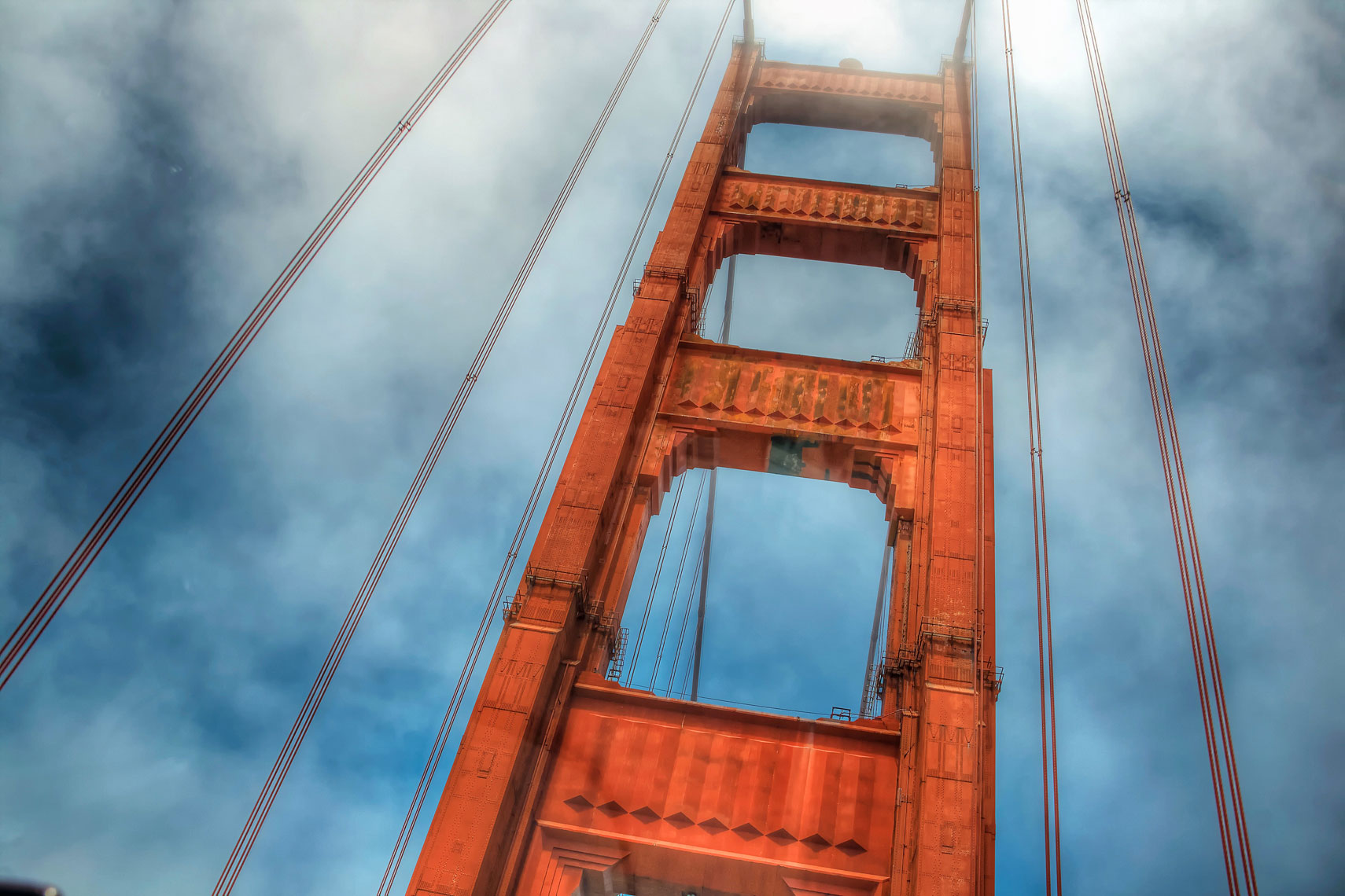 Golden Gate Bridge/looking up/partly cloudy/locaton photography