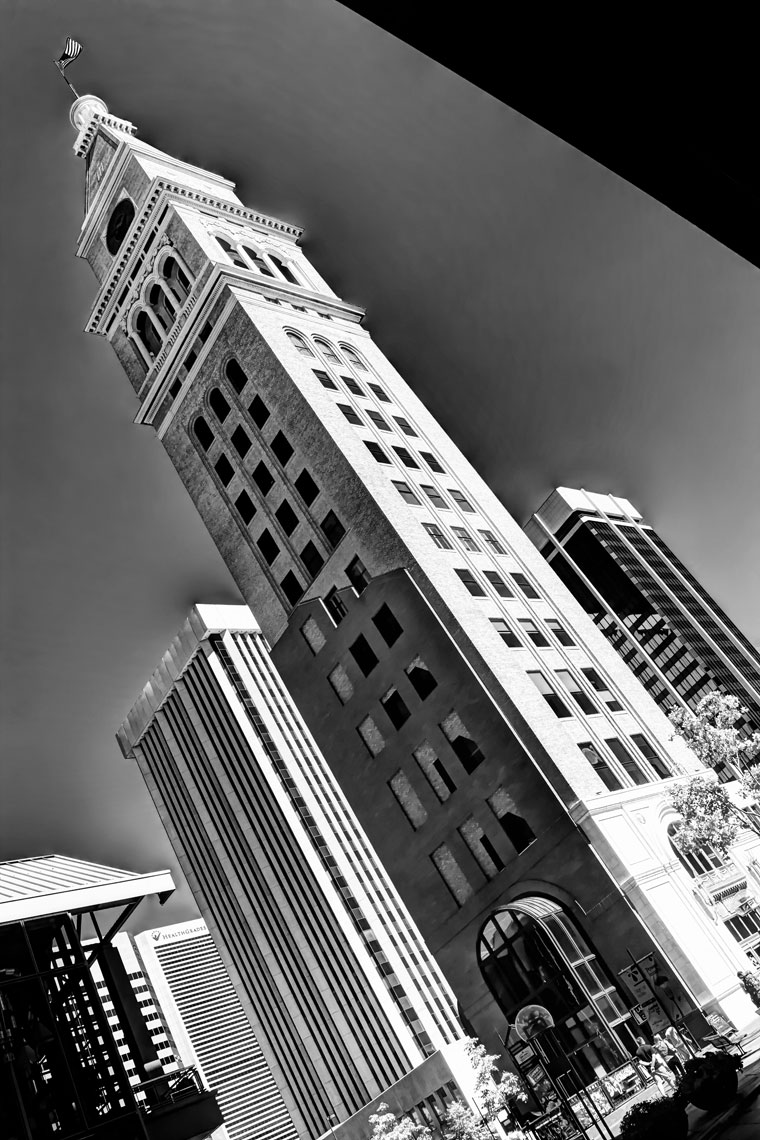 Tall narrow building/US Flag/downtown/Denver/location photography